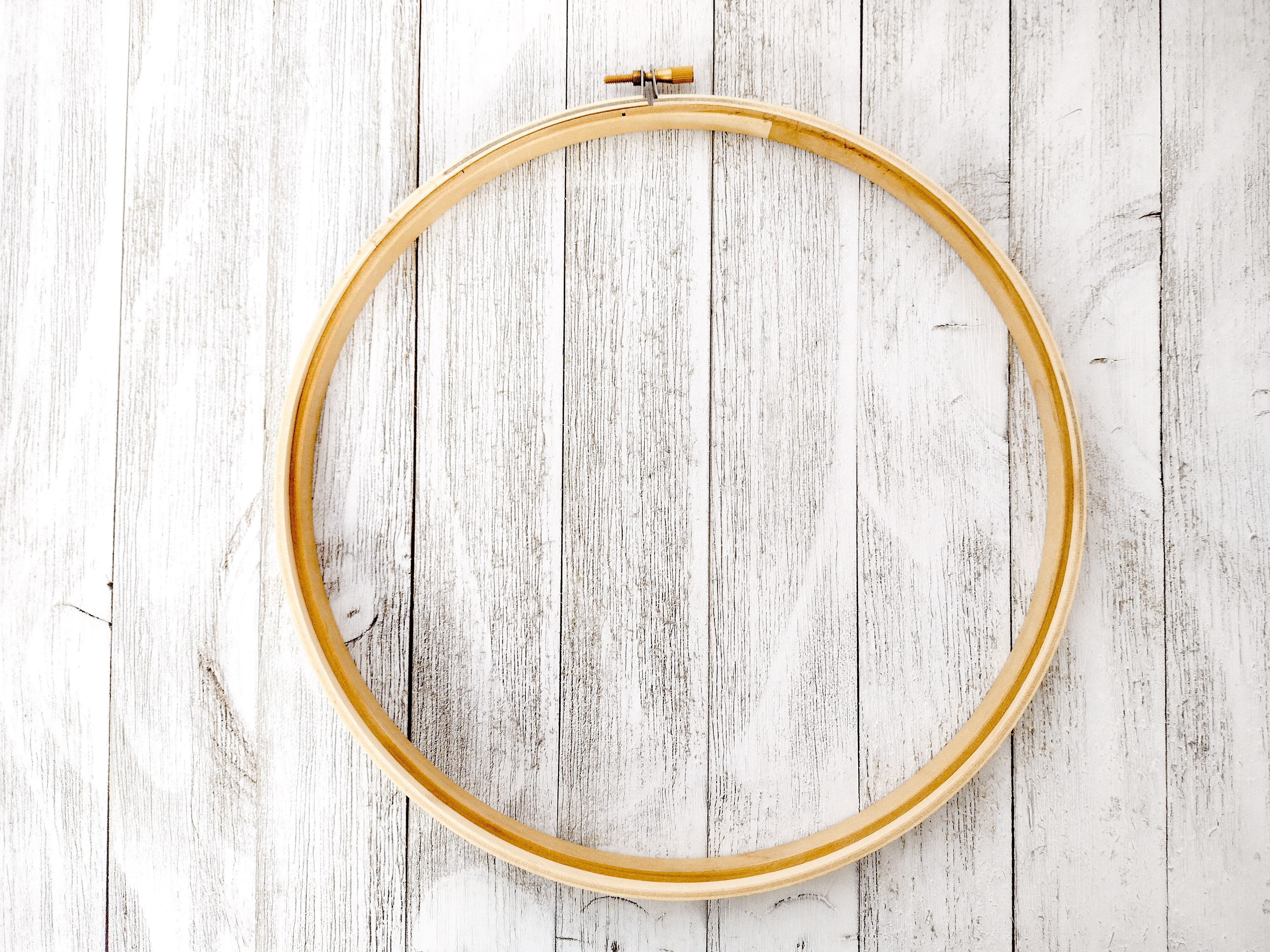 embroidery hoop. this is to hold your fabric while you sew