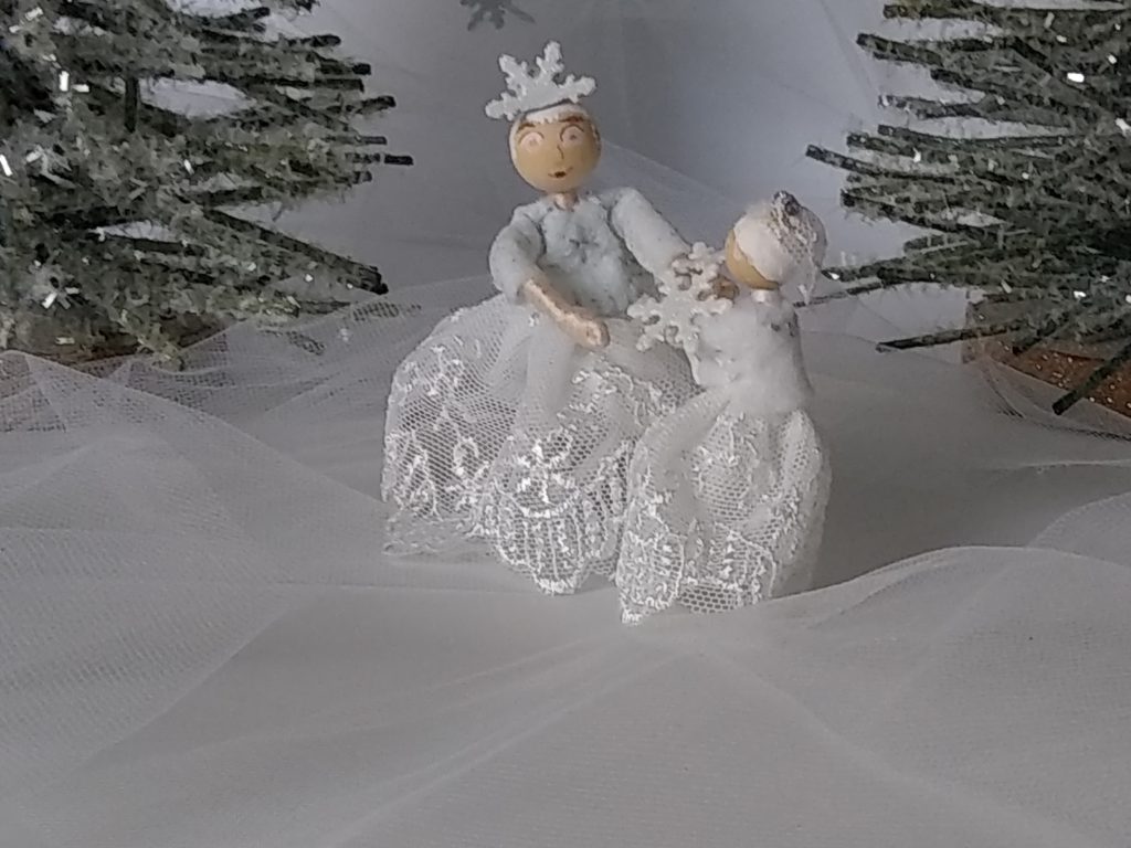 snow queen and snow flake nutcracker dolls