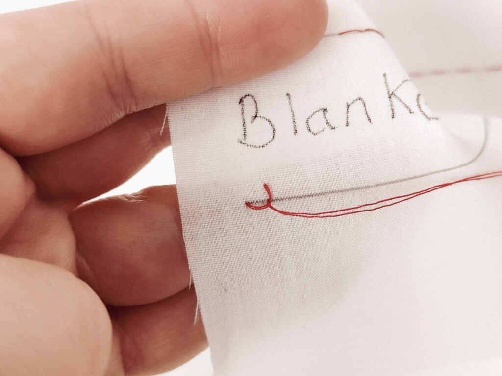 L shaped first stitch of a blanket stitch